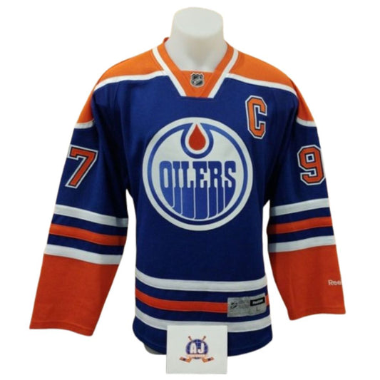 Official Reebok signed jersey - Connor Mcdavid replica rookie blue AJs coa