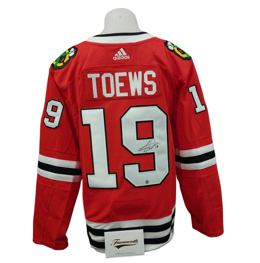 Official Adidas signed jersey - Jonathan Toews home Frameworth coa